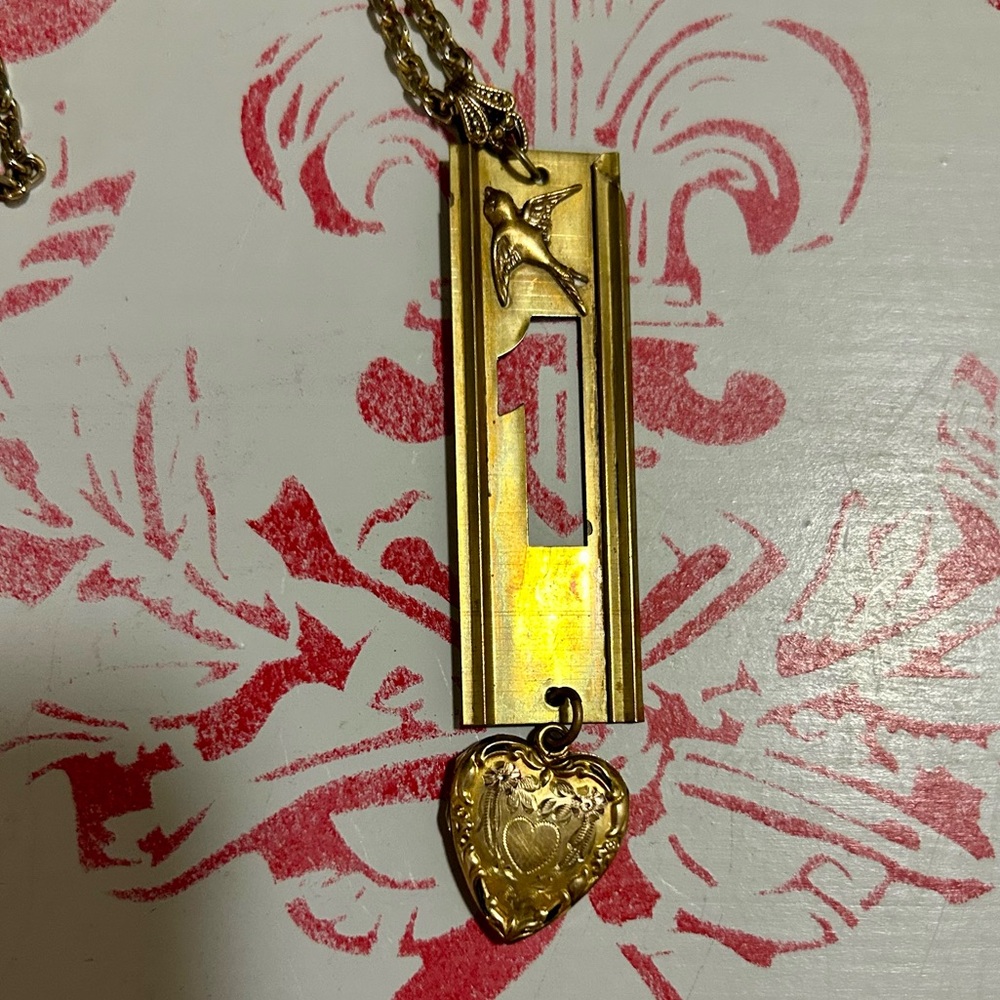 Amazing assemblage architectural and bird and locket necklace